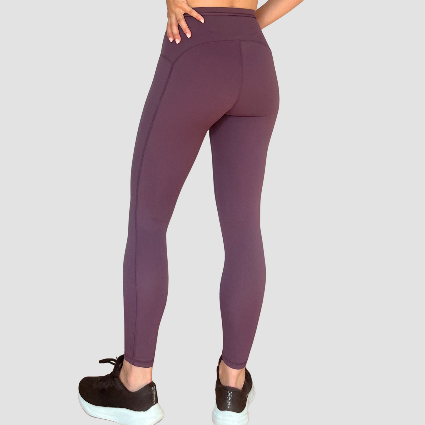 Legging violet avec ceinture originale et galbante de dos