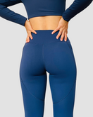 Leïla – legging seconde peau avec poches OraFit, coloris bleu marine vue de dos